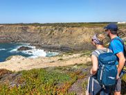 Hiking couple with a view of the sea in the Alentejo