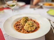 Bread dumplings with chanterelles