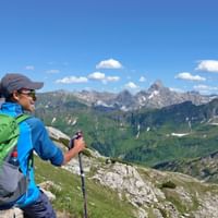 Hiker with a view of the Nebelhorn