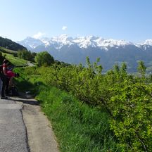 Hiking break in front of snow-covered peaks