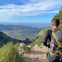 Hiker on the Ofre Pass with a view of Sóller