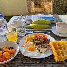 Breakfast with fruit salad and waffle