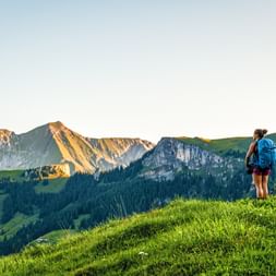 Hiker enjoys the view from Reichenau in the Kandertal