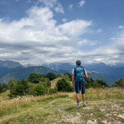 Hikers with a view of the mountain landscape