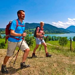Enthusiastic hikers on hiking paths near lake Tegernsee