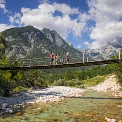 Hike over a bridge in the Soca Valley in Slovenia