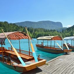 Typical Pletna wooden boats on Lake Bled
