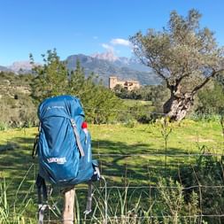 Hiking backpack in a Mediterranean landscape