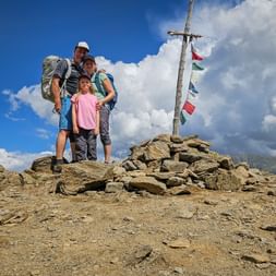 Family at the summit cross