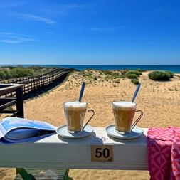 Relaxing coffee break in a beach bar in Praia Verde
