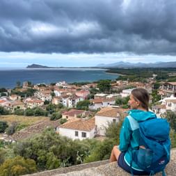 Hiker with a view of Santa Maria Navarrese