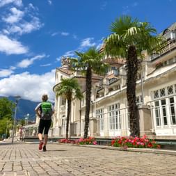 Walkers along the town hall in Merano