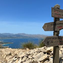 Signposts on the coastal walk to the Alcúdia peninsula