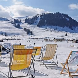 Deckchairs with a view of the ski slope