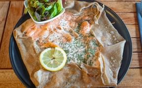 Galettes with salmon and dill sauce