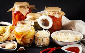 Fermented foods in jars and bowls