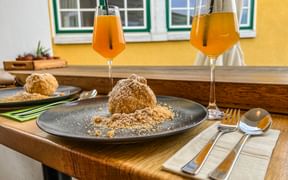 Apricot dumplings and a cold drink in the Wachau