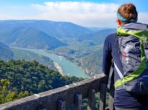 Hiker at the view point Seekopf with view onto Danube