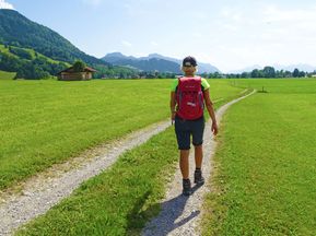 Hiker on the hiking trail from Munich to Garmisch