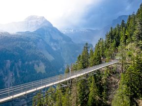 Aerial suspension bridge in the middle of the mountains