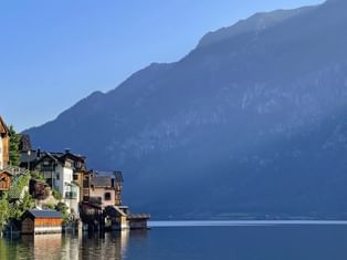 View of houses on Lake Hallstatt with the Feuerkogel in the background