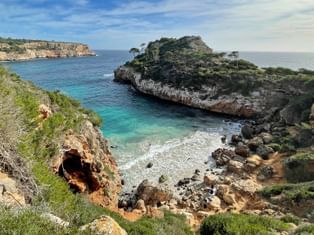 View of the rocky Calo des Moro beach