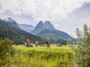 Hikers with a beautiful mountain scenery in Garmisch