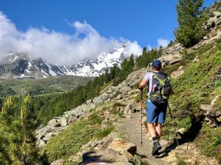 A hiker on the Merano High Mountain Trail in the Schnalstal Valley