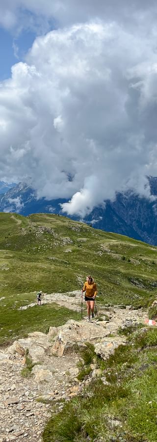 Hiker hikes on a hiking trail in Venet in the Pitztal valley