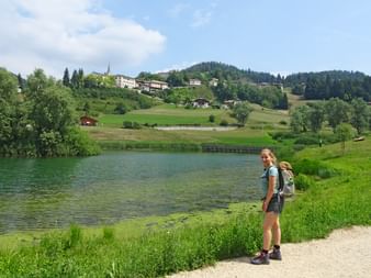 Hikers at the Laghi dei Masi near the Mendel Pass