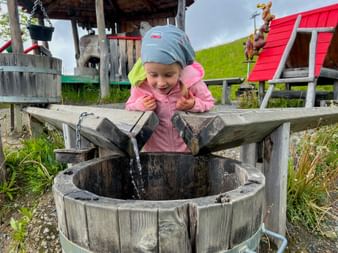 Girls at the water playground during the adventure trail