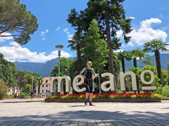 Hiker explores the spa town of Merano
