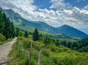 Hiking trail near Kobarid with a view of the mountain landscape