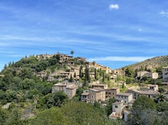 The small hilltop town of Deia on the edge of the Tramuntana mountains