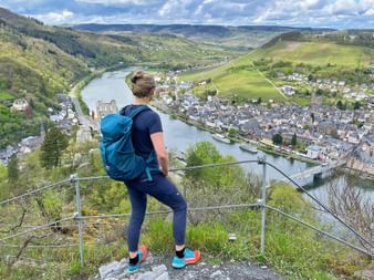 View of the Gevenburg ruins near Traben-Trabach Hiker enjoys the view of the Gevenburg ruins near Traben-Trabach