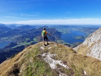 Hiker with a view of the Salzkammergut lakes