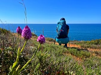 Hiker with sea view in the Algarve