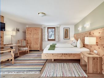 Swiss pine room at Biohotel Stillebach, nestled in the Tyrolean Alps