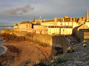 Breathtaking sunset in Saint-Malo at the end of the hiking trip