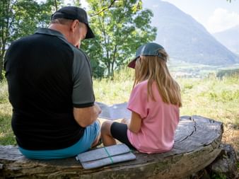 Father and daughter with travel documents