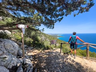 Hiker with sea view near Dorgali