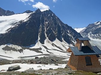 Braunschweiger hut with snow and blue sky