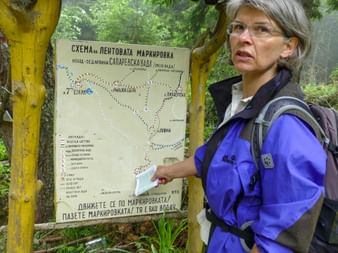 Hiker in front of the map