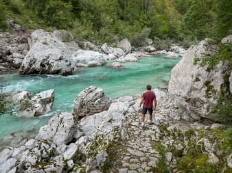 Hikers in Slovenia on the Soca River