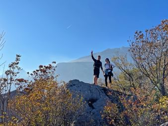 Two hikers in the Sarca Valley