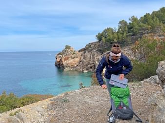 Hiking backpack on the tour from Deia to Soller in Mallorca