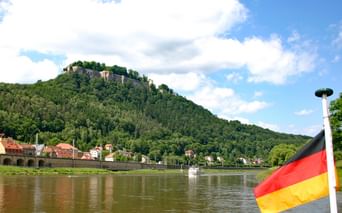 Boat trip at the Elbe with view to the Koenigstein