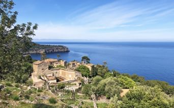 View of a typical finca in front of a bay