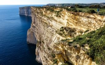 Steep coast with limestone cliffs on Malta