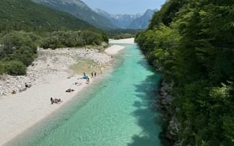 Crystal clear water at Isonzo Beach in Bovec